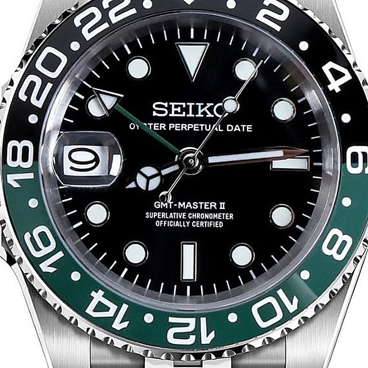 SEIKO GMT sprite — dial and GMT bezel close-up, black/green — Time2Seiko
