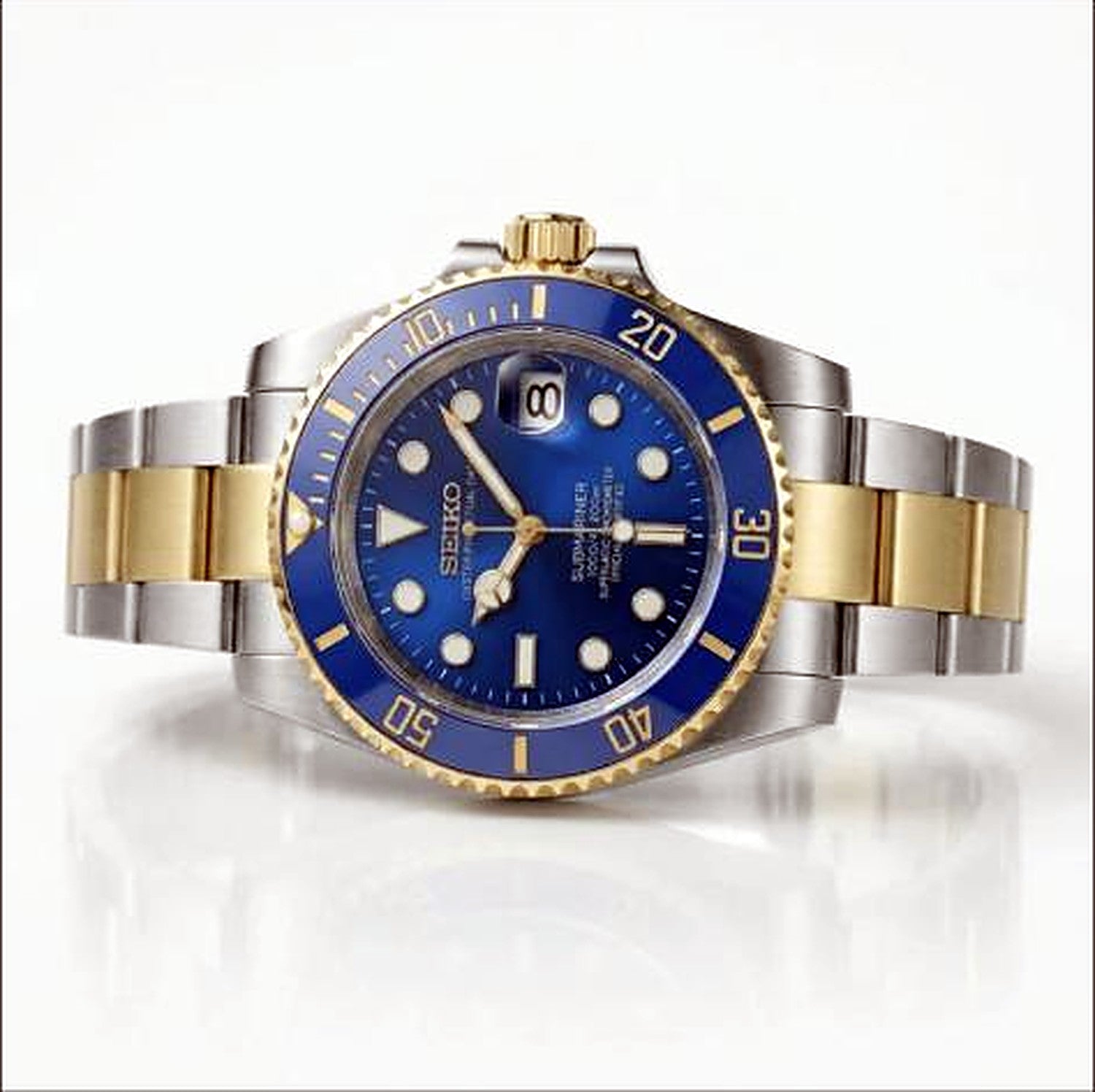 SEIKOMARINER two tone océan — vue 3/4 plongeuse two-tone acier or cadran bleu — Seiko mod SEIKOMARINER Time2Seiko